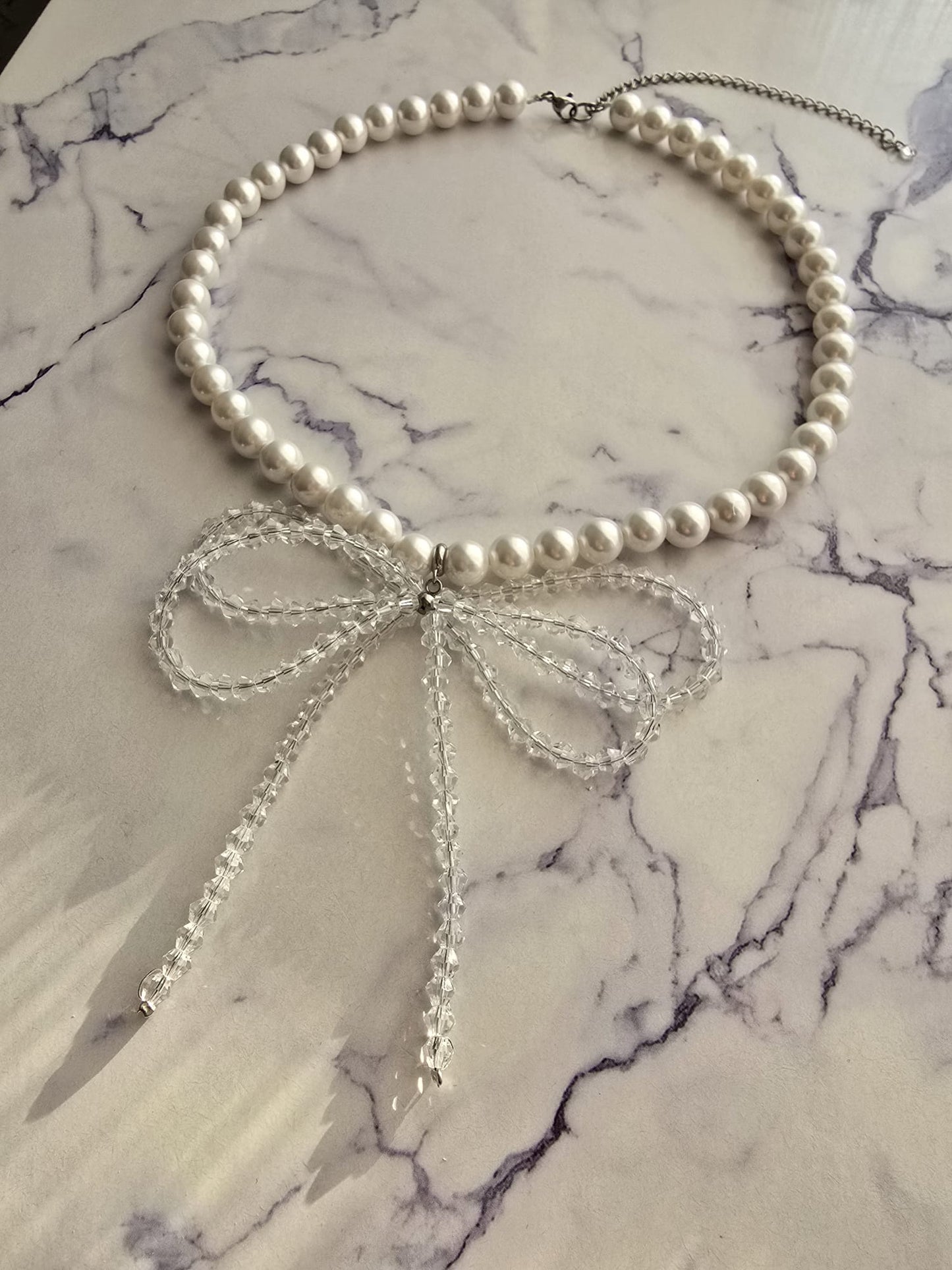 Shell Pearl Necklace with Crystal Double Bow & Silver Finishing