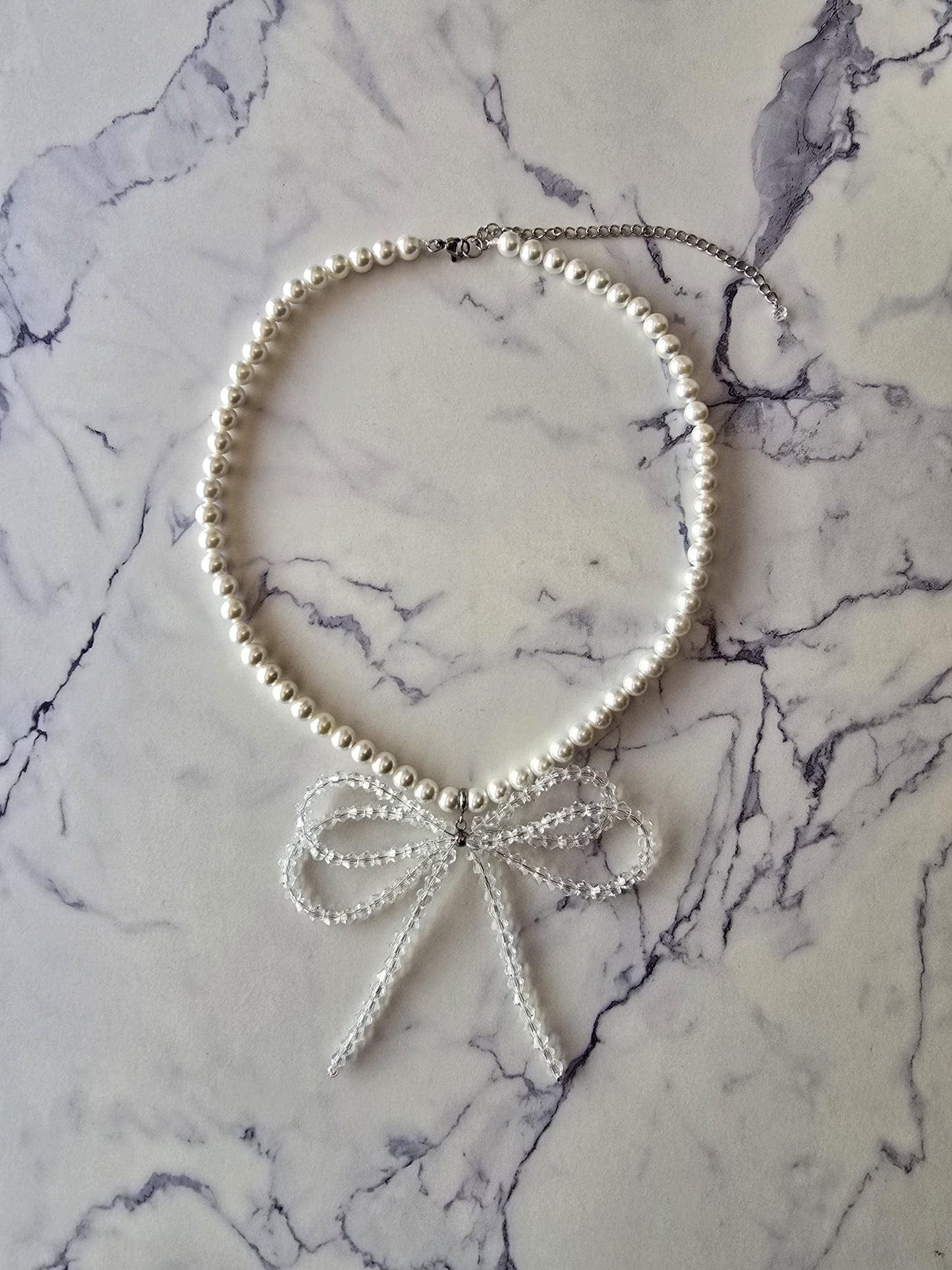 Shell Pearl Necklace with Crystal Double Bow & Silver Finishing