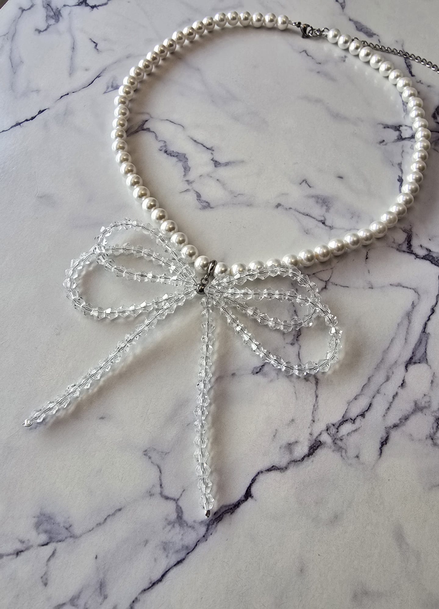 Shell Pearl Necklace with Crystal Double Bow & Silver Finishing