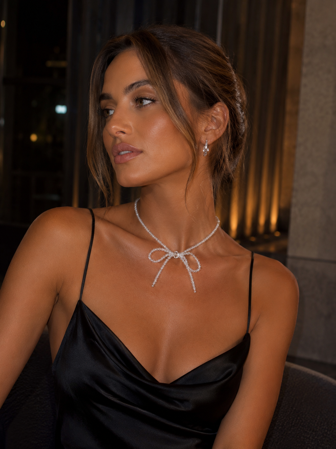 Luminous Transparent Glass Crystals Bow Necklace with Silver Finish