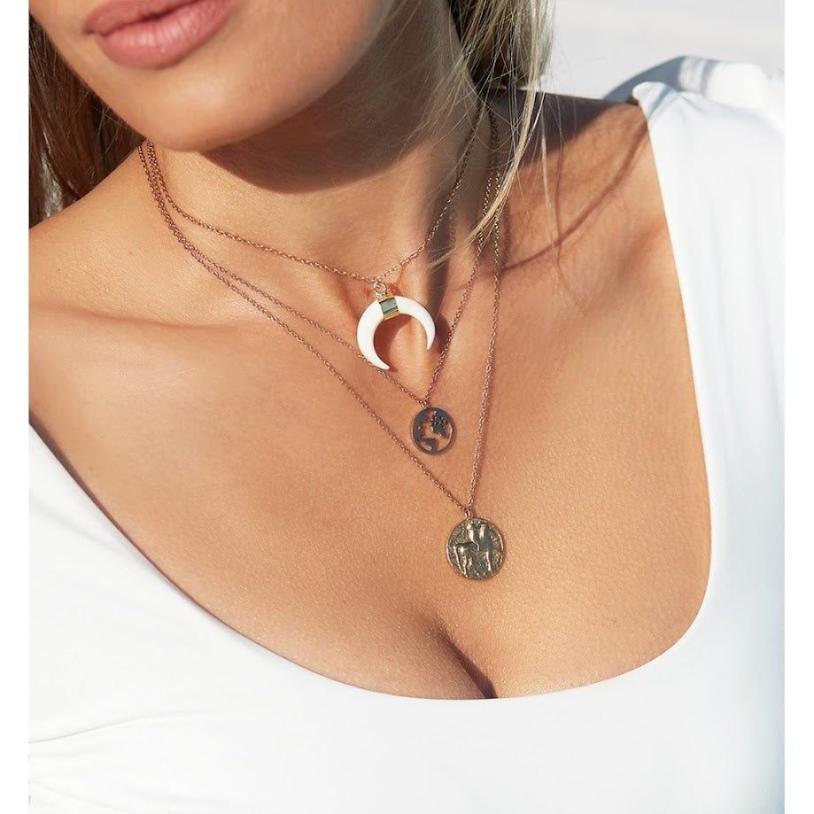 Off White Pearl Horn on Gold Chain